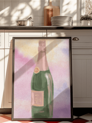Framed watercolor art print of a green champagne bottle with a pink label against a colorful pastel background, perfect for stylish kitchen wall decor.