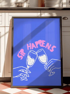 Hand-drawn illustration print featuring two hands clinking champagne flutes on a bright blue background. The slogan "SIP HAPPENS" is written above the toast in large, pink block letters.